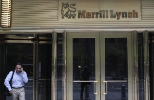 File photo of a man speaking on his mobile while standing in front of the Merrill Lynch building in New York
