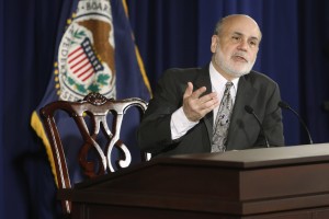 U.S. Federal Reserve Chairman Bernanke responds to reporters during his final planned news conference before his retirement, at the Federal Reserve Bank headquarters in Washington