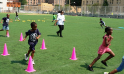 Children run the obstacle course during BCHN's Health Fair Field Day.
