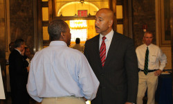 Bronx Borough President Ruben Diaz Jr. speaks with a job seeker during a job fair in the Bronx County Building on Tuesday, September 22, 2015. The event, which was co-sponsored by the borough president, the New York State Department of Labor and the Bronx Overall Economic Development Corporation, featured representatives of 23 companies offering 1,000 jobs, and was attended by hundreds of individuals.