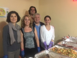     Moujan Vahdat and his family hosting community dinner at Pelham Grand