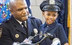 Captain Keith Walton, 49th Precinct NYPD and Tyrone Lowe. Credit: NY Daily News