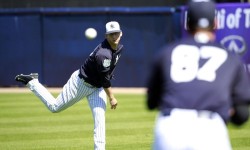 New York Yankees pitcher James Kaprielian (90) and pitcher Brady Lail (87) work out at George M. Steinbrenner Field. Photo Credit: Kim Klement, USA TODAY Sports