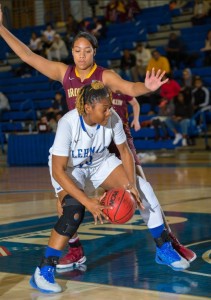 Lehman's Marika Gordon makes way to basket against Brooklyn College defender during CUNYAC conference game at APEX Gym, in the Bronx New York on Friday January 20, 2017. (Photo credit: Robert Cole) 