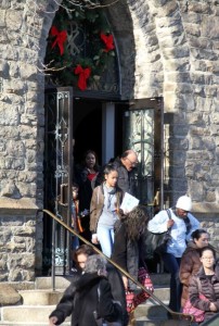 Parishioners exit Christmas day mass at St. Phillip Neri despite a call from ISIS for supporters to attack American churches. Photo by David Greene 