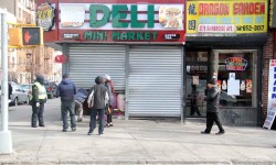 Dozens of Bronx delis shut their doors at 12 noon on Thursday in a protest against President Trump's immigration ban.--Photo by David Greene