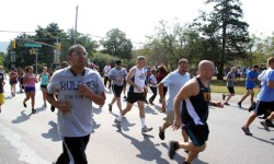 Dozens of participants jogged or walked along Pelham Parkway during the annual event. Photo by David Greene