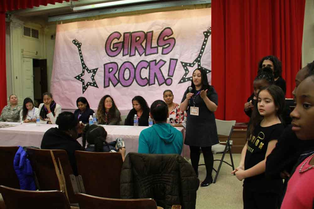Me speaking at local Public School 47 at their Second Annual Girls Rock Event discussing women empowerment and introductions to non-traditional fields for women