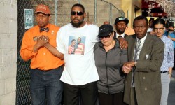 Councilman Andy King joins family of murdered woman, minutes before the rally a 19 year-old man was shot dead in West Farms. Photo by David Greene