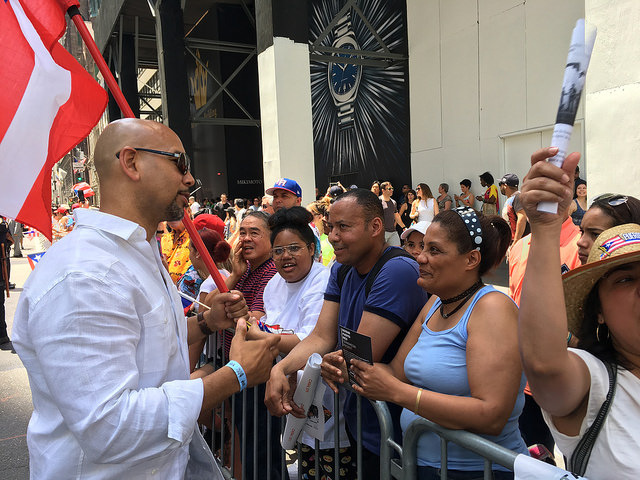  Bronx Borough President Ruben Diaz Jr. greets spectators along the route of the 60th Annual National Puerto Rican Day Parade on June 11, 2017.