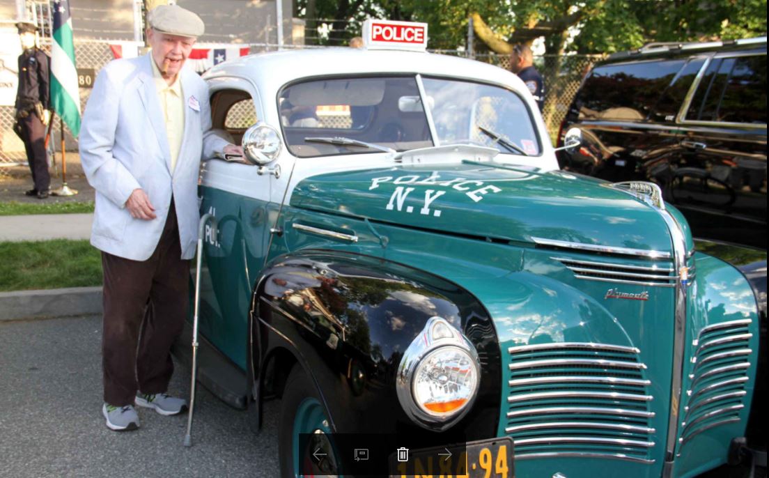 Retired NYPD Captain Tom Walker, 81 (next to a vintage sector car) turned his memoirs into a best selling novel and film, "Fort Apache, The Bronx" which starred actor Paul Newman. Photo by David Greene
