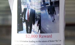 A missing persons flyer announced the disappearance of Robert "Rico" Lane, who disappeared on July 3 and found found dead on July 10.--Photo by David Greene