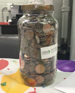 NYCHA residents were challenged to save loose change in a jar. Photo: NYCHA on Instagram