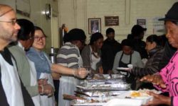 Volunteers served more than 450 meals during a Thanksgiving dinner held at the Fordham United Methodist Church on Marion Avenue.--Photo by David Greene