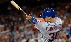 Sep 9, 2015; Washington, DC, USA; New York Mets left fielder Michael Conforto (30) hits an RBI single during the ninth inning against the Washington Nationals at Nationals Park. New York Mets defeated Washington Nationals 5-3. Mandatory Credit: Tommy Gilligan-USA TODAY Sports